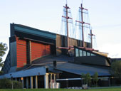 Exterior of the Vasa museum, with steel masts on the roof symbolizing the rig and sails of the Vasa ship